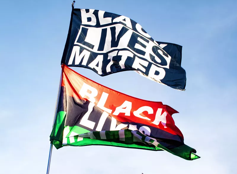 Image: The Miami-Dade school board voted unanimously on December 14, 2022, to approve new classroom flag restrictions.