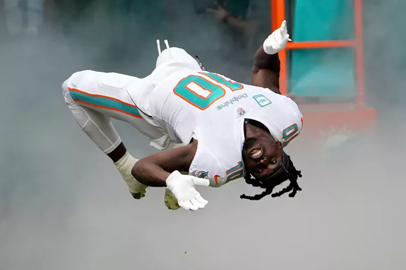Image: Tyreek Hill of the Miami Dolphins takes the field during player introductions on November 27, 2022 in Miami Gardens.