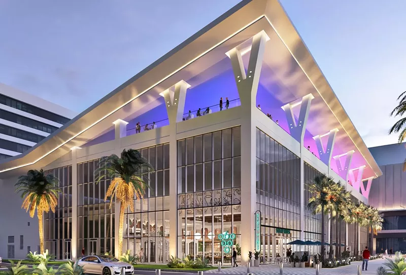Image: a giant building with a rooftop restaurant