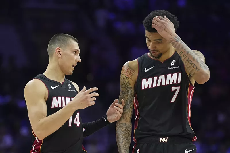 Image: Tyler Herro #14 of the Miami Heat talks to Kel'el Ware #7 against the Philadelphia 76ers in the first half at the Wells Fargo Center on March 29, 2025, in Philadelphia, Pennsylvania.