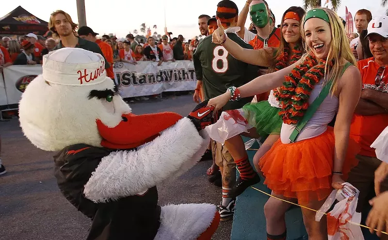 Image: Miami Mascot Sebastian the Ibis Hits on Syracuse Reporter as Hurricanes Fall to Orange