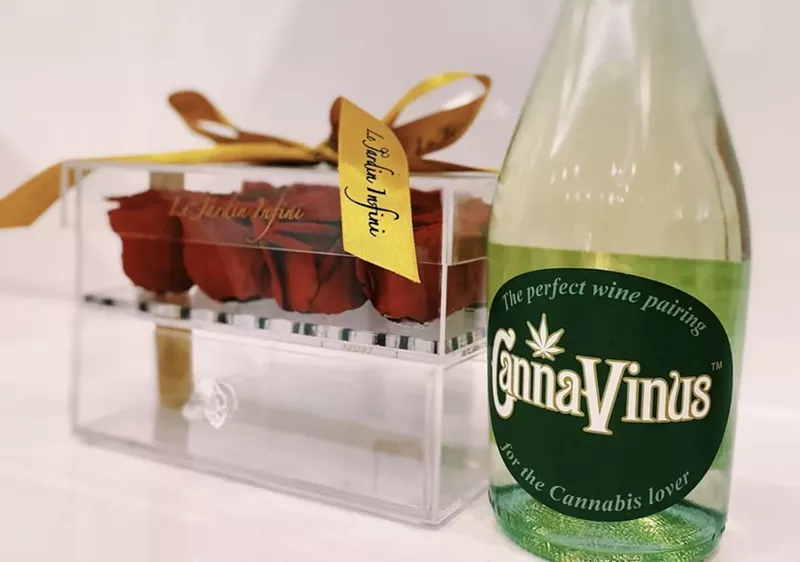 Image: A wine and a box of roses