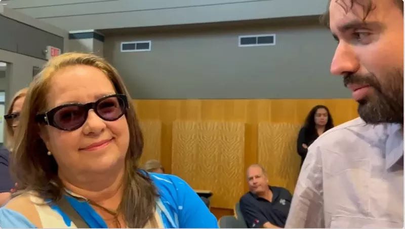 Image: Beba Sardiña Mann looks at the camera next to Thomas Kennedy
