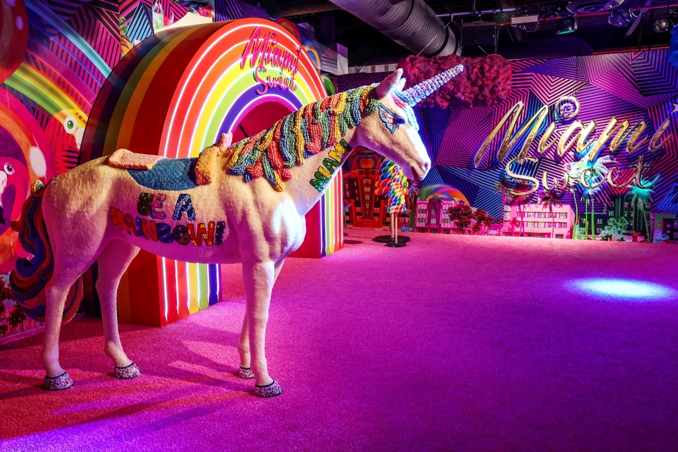 Unicorns and rainbows made of candy welcome you to Miami Sweet.