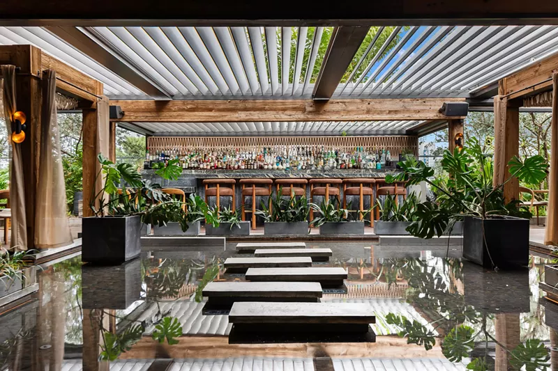 Image: A water garden outdoor dining area