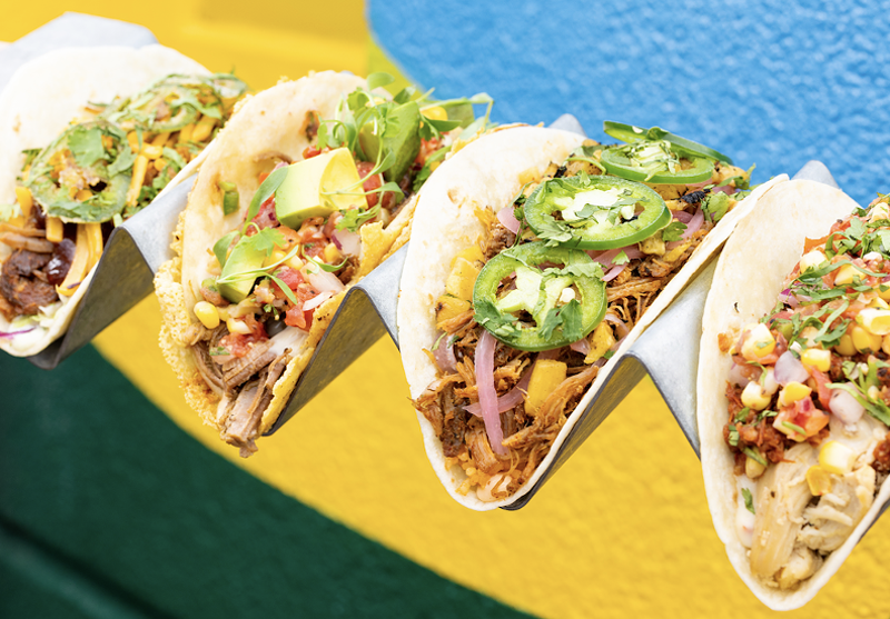 Image: A row of colorful tacos