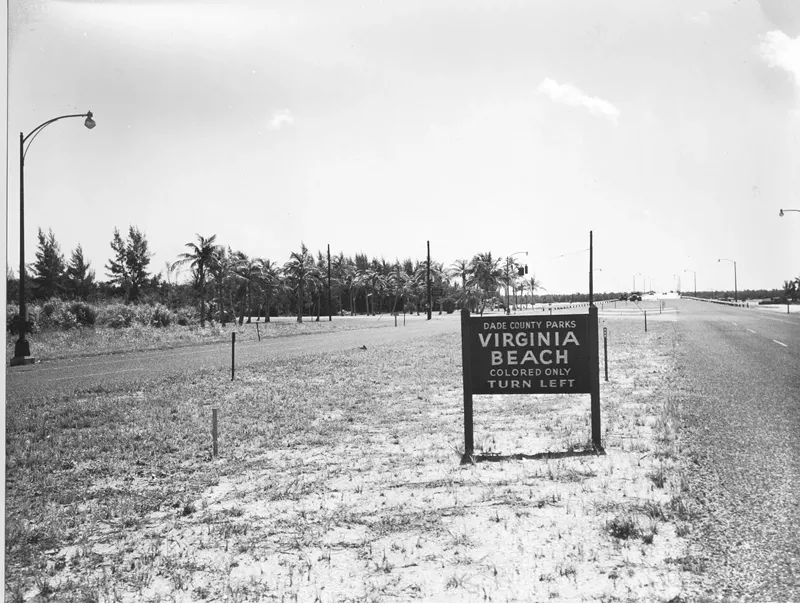 Image: Undated photo, circa 1950s, of a sign along the Rickenbacker Causeway connecting the Miami mainland to Virginia Key