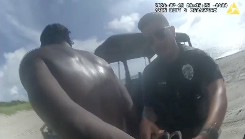 Bodycam footage showing police arresting Keith Hill Jr. on Hollywood Beach on July 19, 2024. Hill is suspected of sexually assaulting a woman rollerblading on the Miami Beach Beachwalk three days earlier.