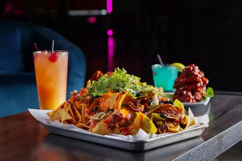 Image: A new entertainment complex has opened in Kendall with an in-house restaurant serving up a menu of all-American eats.