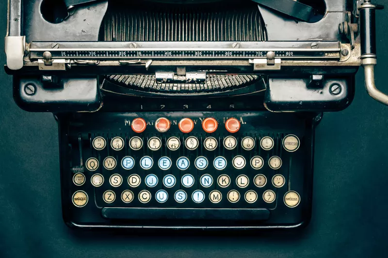Image: antique typewriter with keys photoshopped to read "PLEASE JOIN US"