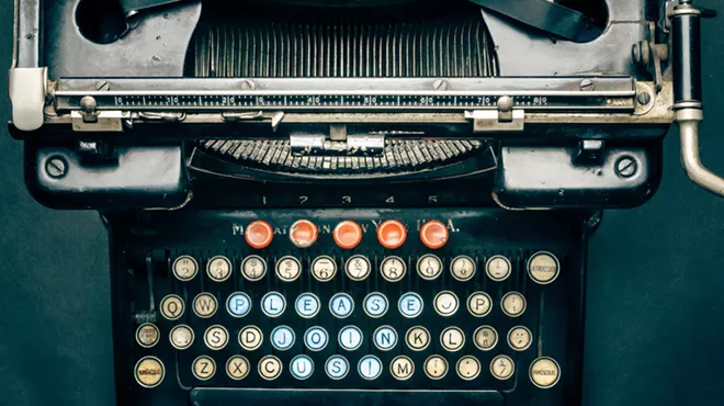 antique typewriter with keys photoshopped to read "PLEASE JOIN US"