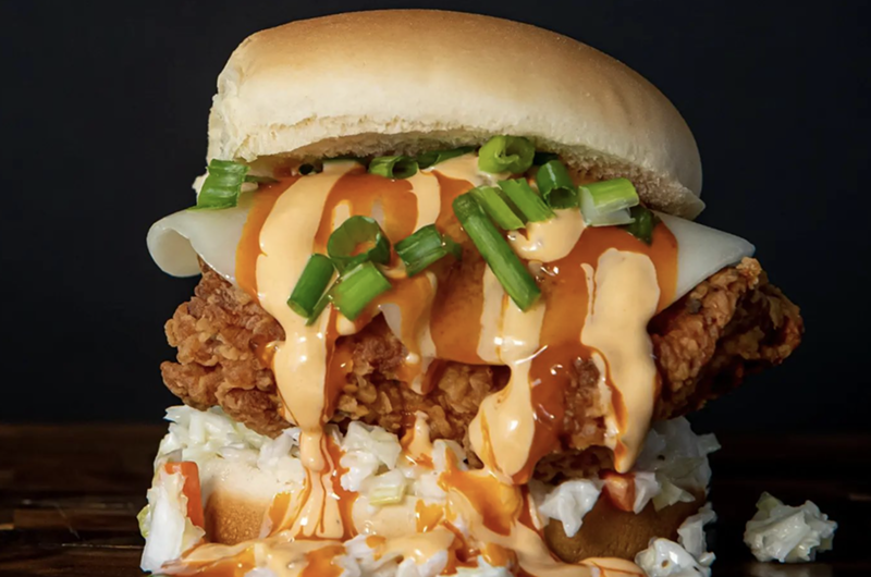 Former NFL star Randy Moss will open Crisspi's Chicken in Miami this fall bringing his fried chicken sandwiches covered in sauce to South Florida.