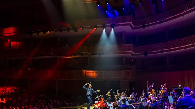Picture of an orchestra in stage.