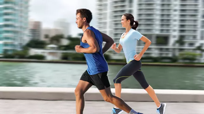 Man and woman jogging in Miami