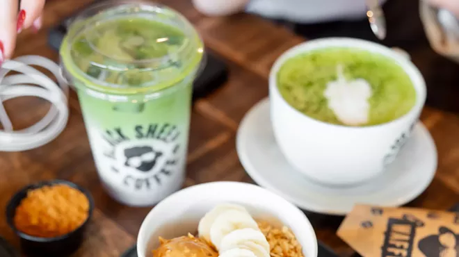 matcha drinks and a fruit bowl on a table