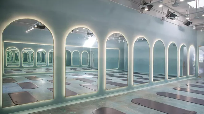 a room with domed mirrors and domed mats on the ground