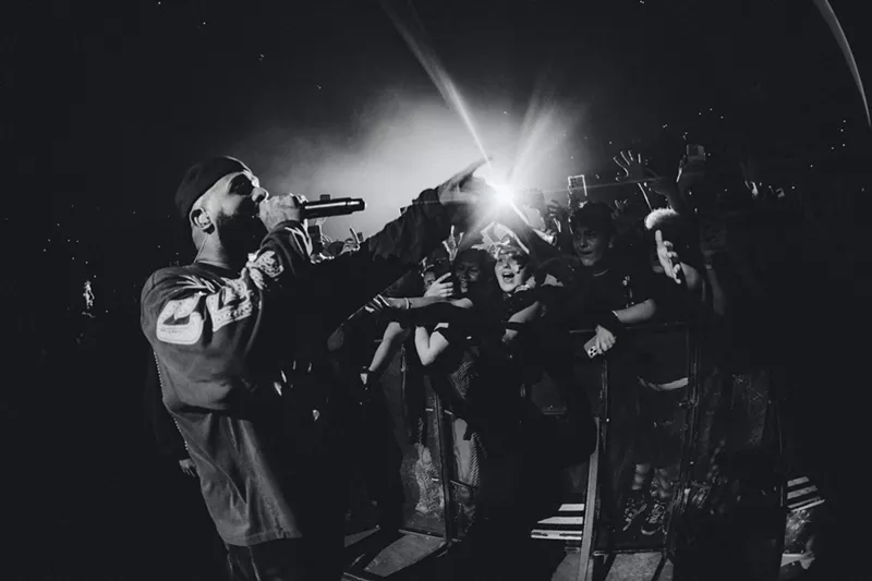 Image: Picture of Eladio Carrion performing in front of fans.