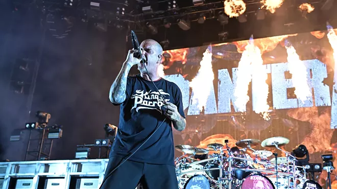 Picture of Phil Anselmo of Pantera singing on stage.