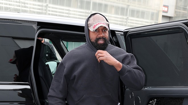 Rapper Kanye West in a black sweater