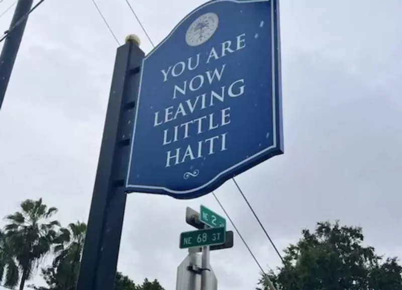 Image: A sign at NE 68th Street and NE Second Avenue implies that Little Haiti is much smaller than it should be, leaving some residents worried about a shrinking neighborhood.