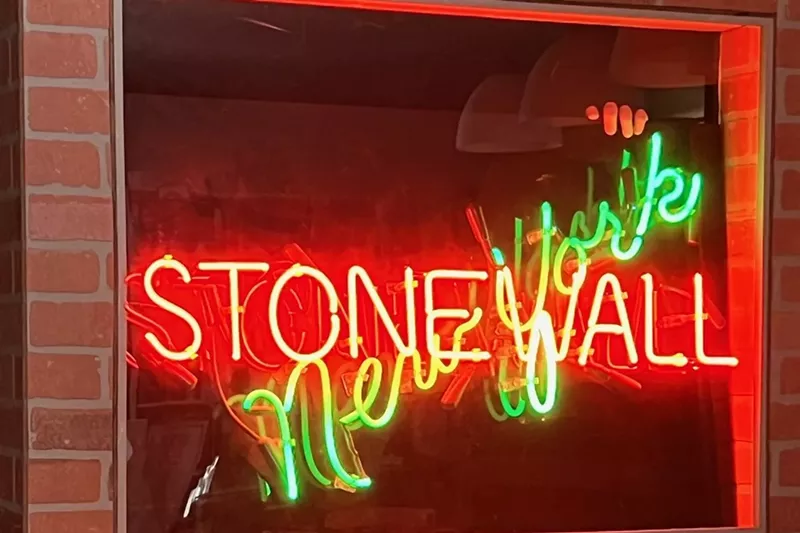 Image: A neon sign reading Stonewall New York