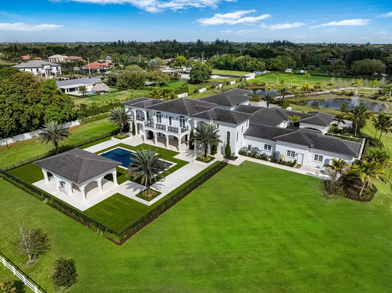 Image: An overhead view of the estate and its 10-acre plot, including a reflecting pool and pond.