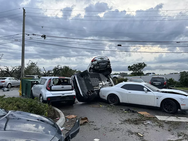 Image: A tornado lifted cars in the air and tossed them about when it passed through Palm Beach Gardens on April 29.