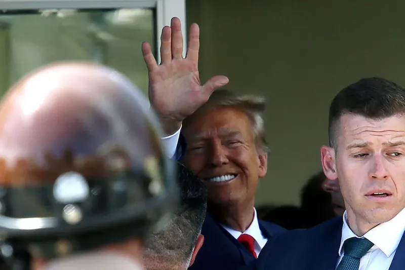 Image: Former President Donald Trump waving to the crowds outside Versailles after his arraignment on June 13 in Miami.