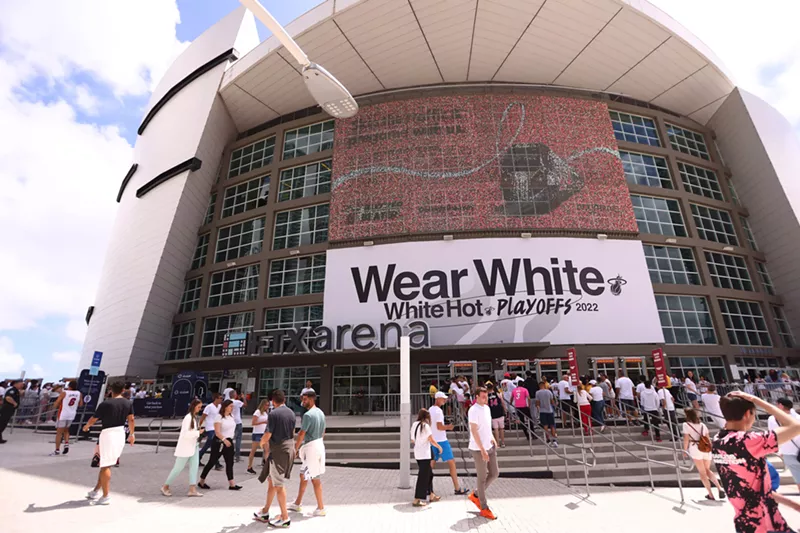 Image: Fans arrive at FTX Arena in Miami prior to the first game of the 2022 NBA playoffs.