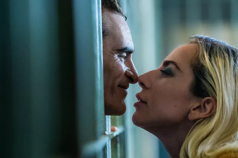 Image: Still of Joaquin Phoenix and Lady Gaga in Joker: Folie à Deux