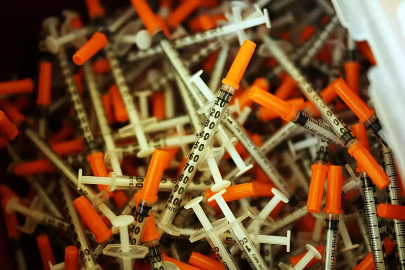 Image: The opioid epidemic is especially pronounced at Miami's first needle exchange. But last year the clinic was hit with a new epidemic: COVID-19