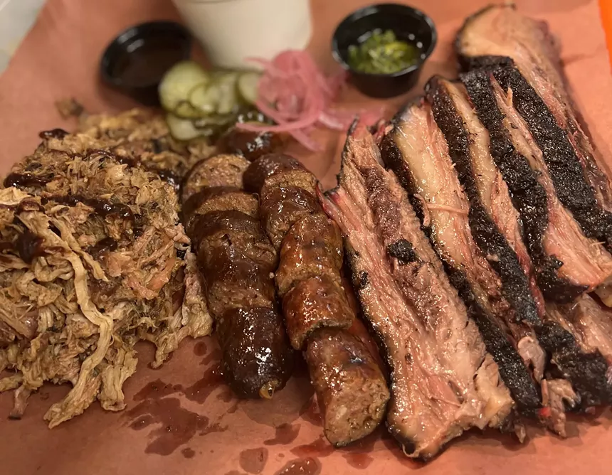 Smoke & Dough's meat selection includes pulled pork, timba sausage, and cafecito-rubbed brisket. - PHOTO COURTESY OF SMOKE & DOUGH