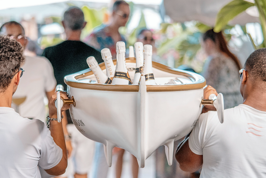 Nothing says Sunday brunch like a boat of bubbly at Joia Beach. - PHOTO COURTESY OF JOIA BEACH