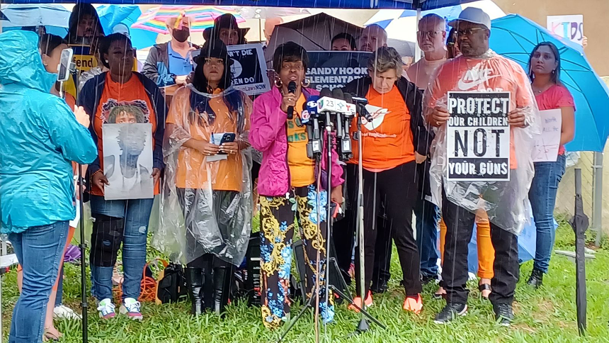 Local activist Tangela Sears (center) was among those who called on Marco Rubio to help enact federal gun-law reform amid the current spate of mass shootings. - PHOTO BY JOSHUA CEBALLOS