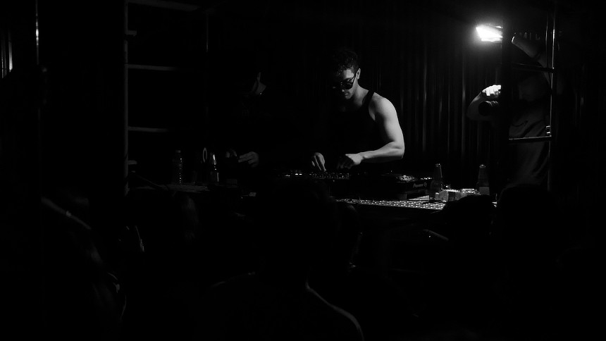 A DJ spinning inside the venue