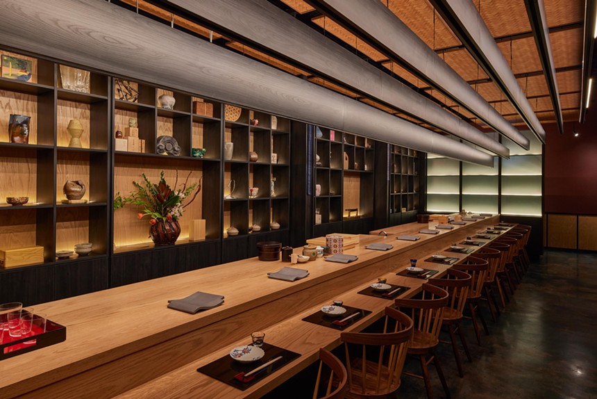 Ogawa's sushi counter gives guests a view of Japanese artwork and crafts as they enjoy the omakase experience.