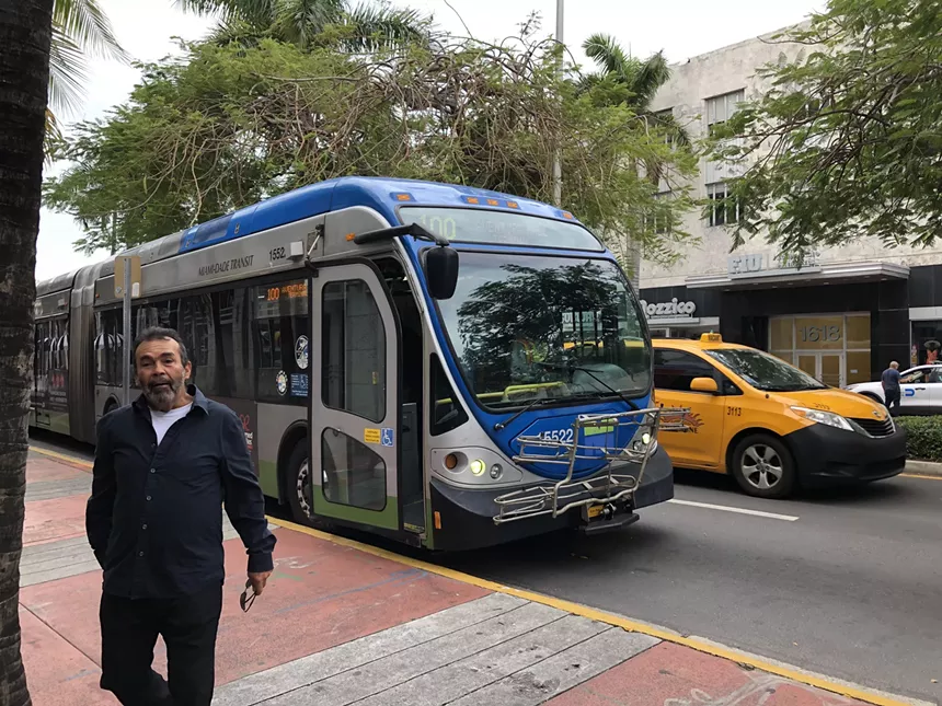 A bus stops at Washinton Avenue and Fifth Street in Miami Beach
