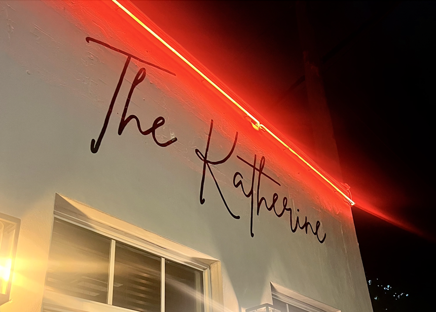 The red neon line above the Katherine's signage shines bright
