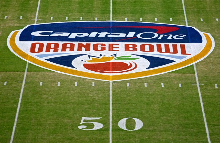 The Capital One Orange Bowl logo painted on the field at Hard Rock Stadium