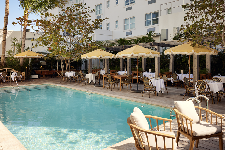The pool and yellow umbrellas