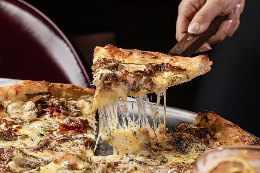 Pizza being pulled