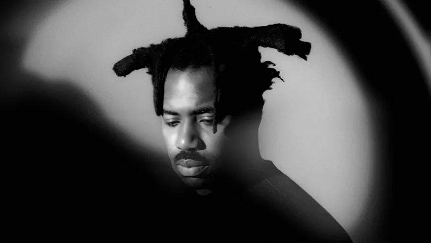 Black and white photo of Sampha