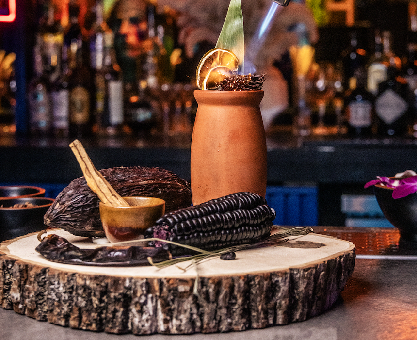 A cocktail with garnish