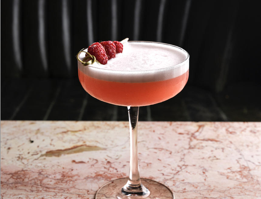 A cocktail in a stemmed glass at Deliah Miami