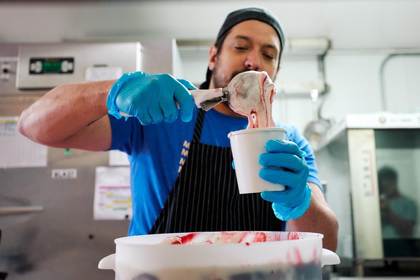 Man scooping ice cream