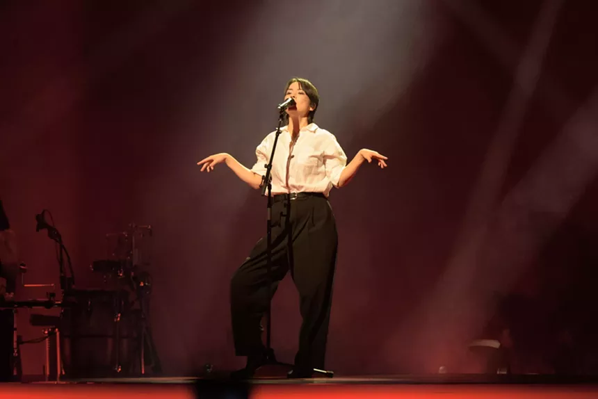 Mitski performing on stage