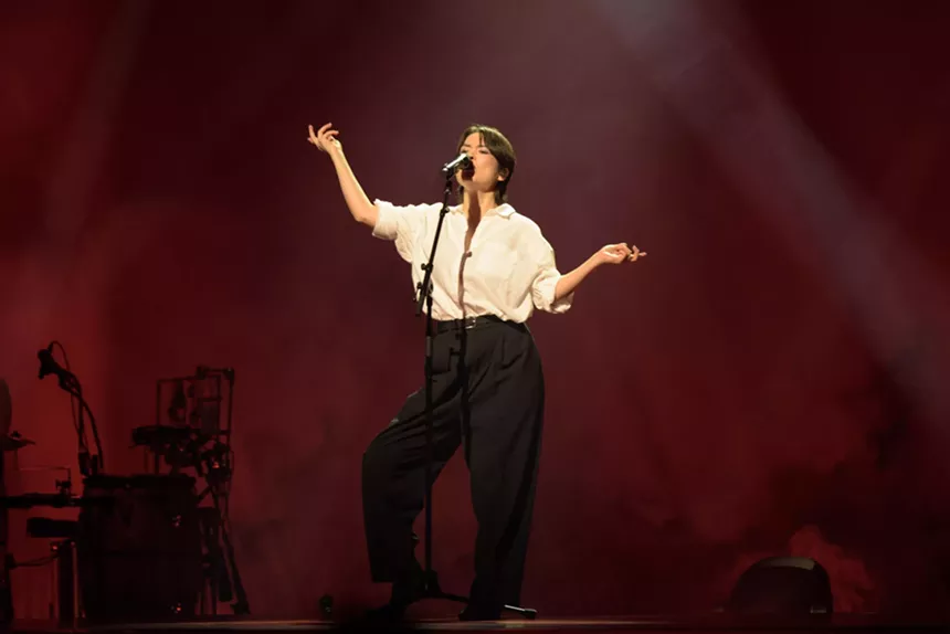 Mitski performing on stage