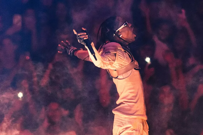 Travis Scott performing at the Kaseya Center
