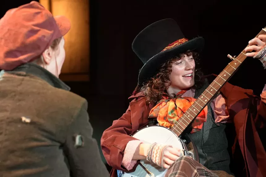 Hallie Walker as Oliver and Staci Stout as the Artful Dodger on stage in the production of Oliver!