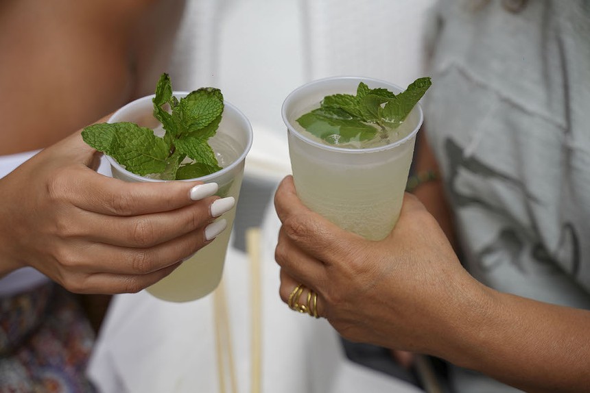 Two mojitos in plastic cups